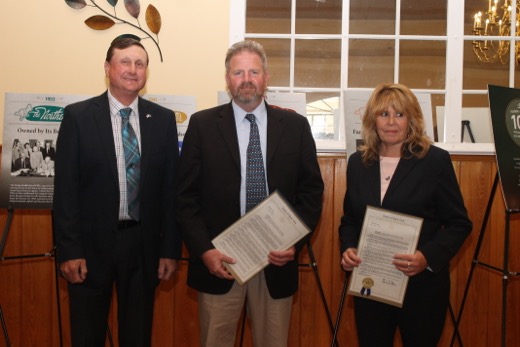 Jeff Kito, aide to State Senator Ken LaValle, left, with Eric Keil and Sharon Frost.